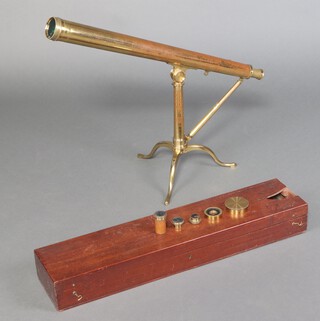 An early 19th Century brass refracting 2.5 inch table telescope, signed BATE LONDON to tube on raised folding tripod base with cabriole legs, rack and pinion adjustment tube with handled key, in fitted mahogany case containing three eyepieces and lens cover, 73cm l, extends to approx 114cm 