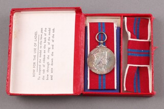 An Elizabeth II Coronation medal, ladies issue, boxed 