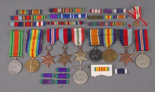 A pair, British War medal and Victory medal to DM2-075399 Pte. A E Budd Army Service Corps, a Victory medal to G-19534 Pte. A Peet Royal West Kent Regt., a France and Germany Star, two Second World War British War medals, a Defence medal, possible facsimile 1939-45 Star, Italy Star, France and Germany Star together with various medal ribbons 