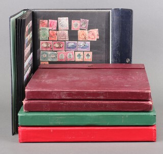 Four stock books of mint and used Commonwealth stamps George VI to Elizabeth II including Aidan, Ascension, Botswana, Bahamas, British Honduras, New Zealand, Papua New Guinea, Sarawak, Turks and Caicos, North Borneo etc 