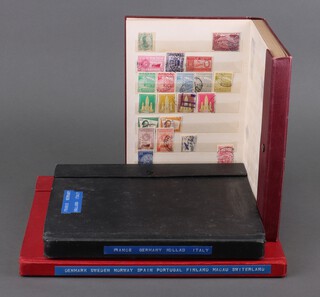 Three stock books of mint and used stamps including Denmark, Sweden, Norway, Spain, Portugal, Finland, France, Germany, Holland, Italy and South America 