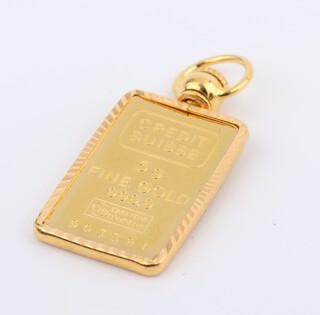 A Singapore Mint 5 gram 999.9 standard ingot in a 2.1 gram 9ct gold mount 