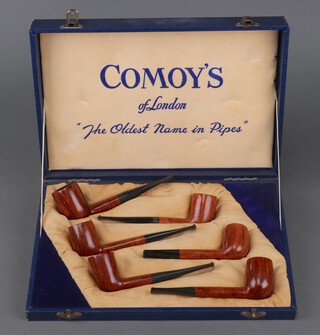 Two Comoy's pipes nos. 36 and 296 and no.36  together with 4 Selected Straight Grained pipes nos. 30, 36, 66 and 186 (all pipes have been used), all contained in a Comoy's case 