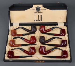 Twelve Orlik Supreme pipes including an LX116, LX30, T116 (x2), L18 (x2), L24, T30, L186, and 2 marked Orlik Straight Grain, all contained in a Dunhill presentation case (all pipes have been used)