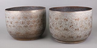 A near pair of circular Benares brass jardinieres 27cm x 37cm 