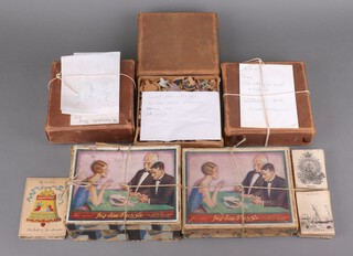 A Chad Valley Coaching Inn jigsaw puzzle, boxed and complete, ditto (1 piece missing), a wooden "The Hunt Supper" jigsaw complete, an Ernest Walbourn jigsaw complete, 1 other with non original box and a child's card game 