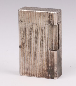 A gentleman's silver plated Dupont cigarette lighter with ribbed decoration 