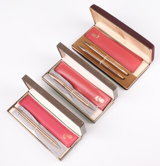 A lady's Cross gold plated propelling pen and pencil, cased, engraved monogram, 2 others, boxed separately 