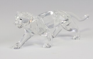 A Swarovski Crystal figure of a walking panther 5cm, boxed 