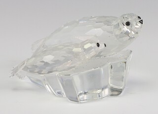 A Swarovski Crystal figure of a seal and cub 5cm, the base marked T, boxed 
