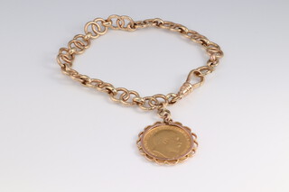 A 9ct yellow gold bracelet 18cm, with a 1908 half sovereign in a 9ct mount, the 9ct gold 15.1 grams 
