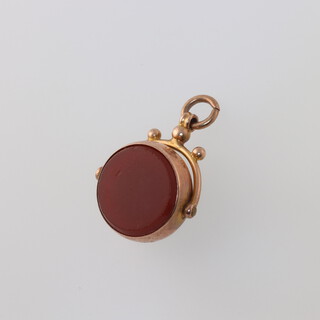 A 9ct yellow gold double swivel hardstone seal 4.7 grams 