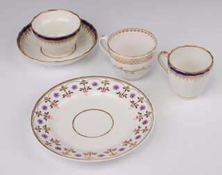 An 18th Century Royal Crown Derby  blue and gilt banded tea bowl the base with cypher mark, a similar cup, 18th Century Derby blue and gilt banded cup and circular Bloor Derby plate with gilt and floral decoration 18cm 
