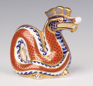 A Royal Crown Derby Imari pattern paperweight in the form of a dragon LIII with gold stopper 11cm