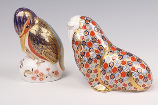 Two Royal Crown Derby Imari pattern paperweights - Kingfisher LXII with gold stopper 12cm, walrus LIV gold stopper 12cm 