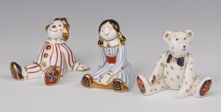 Three Royal Crown Derby Imari pattern paperweights - Treasures of Childhood Rag Doll 2000 MMIII 7cm, Stripy Clown MMIV 8cm and a bear marked G 6cm, all without stoppers 