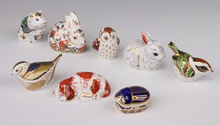 Five Royal Crown Derby Imari pattern Collectors Guild paperweights - bunny MMIII 7cm, meadow rabbit 7cm, owlet 6cm, firecrest 5cm all with gold stoppers and puppy silver stopper (cracked) and 3 others - hamster MMXI 6cm, bird MMX 4cm and Millennium bug with gold stopper the last three all have gold stoppers all boxed 