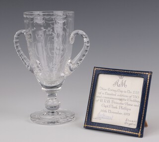 A Stuart Crystal limited edition twin handled loving cup to commemorate the wedding of Princess Anne and Captain Mark Philips 1973, no.255/750 18cm 