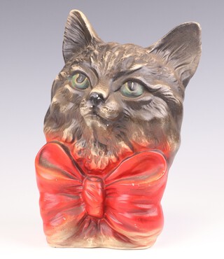 A pottery money box in the form of a portrait bust of cat with red collar ribbon, in the Louis Wain manner, base impressed Ellgreave England 22cm 