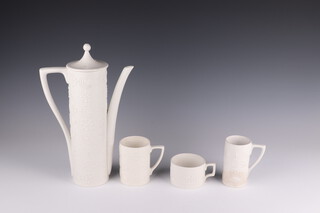 A 42 piece Portmeirion Totem coffee/dinner service comprising 2 tureens 1 with cover, butter dish (cracked), salt, pepper, 2 tea plates, bowl (cracked), 5 small mugs (1 cracked), 4 large mugs (2 cracked), 6 coffee cups, 6 saucers, 3 tea cups (2 cracked), 6 saucers (4 cracked), coffee pot (cracked), milk jug, sugar bowl, 2 saucers (1 cracked) 