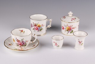 A 54 piece Royal Crown Derby Posies pattern tea service comprising tea pot, large jug, 2 preserve jars and covers, small comport, sugar bowl, cream jug, tea strainer with stand, mustard pot, salt, pepper, 2 small bowls, place card holder, 3 small vases, bread plate, 6 tea plates (1 cracked), 6 cups (1 cracked), 6 saucers, 3 cups (2 seconds), 3 coffee cups, 3 saucers (1 cracked), 2 mugs, 4 egg cups, bread knife (handle f), 6 tea spoons (f and r, 1 chipped) and 2 similar bowls and a trinket box and cover 