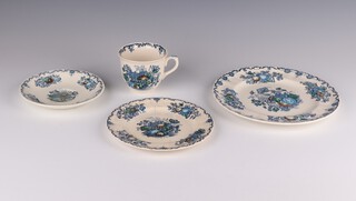 A 54 piece Masons fruit basket pattern dinner/tea service comprising 9 dinner plates (6 cracked), 6 side plates (2 cracked, 3 chipped), 8 side plates (1 chipped, 3 cracked), 4 shallow bowls (3 cracked), 5 pudding bowls (all cracked), 3 bowls (1 cracked), sauce boat and stand (chip to boat), sugar bowl (cracked), 8 tea cups (6 cracked), 7 saucers (6 cracked)