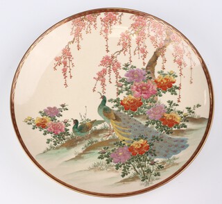 An early 20th Century Satsuma plate decorated with exotic birds 36cm