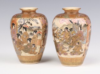 A pair of early 20th Century Japanese Satsuma vases decorated with panels of figures 12cm 