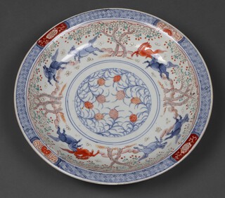 An early 20th Century Imari shallow dish decorated horses 37cm