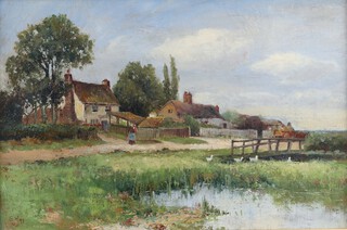 E Walbourn, 19th Century oil on canvas monogrammed E W '97, study of a farm pond with figures and buildings 29cm x 45cm 