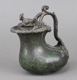After the antique, an Askos bronze water jug decorated seated goats 16cm x 14cm x 10cm 