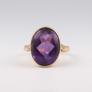 A 9ct yellow gold cabochon cut amethyst dress ring size N, 5.2 grams 