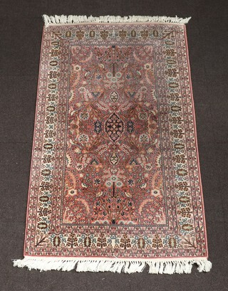 A pink and blue ground North Persian rug decorated a tree with birds 169cm x 93cm 