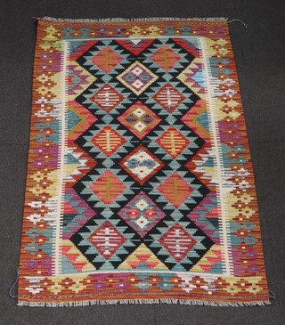 A black, green and brown ground Maimana Kilim rug 153cm x 100cm 