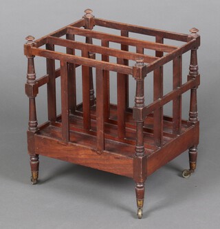 A 19th Century mahogany three division Canterbury, raised on turned supports 46cm h x 38cm w x 32cm d 