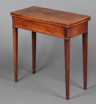 A 19th Century rectangular mahogany tea table raised on square tapered supports 74cm h x 72cm w x 35cm d  