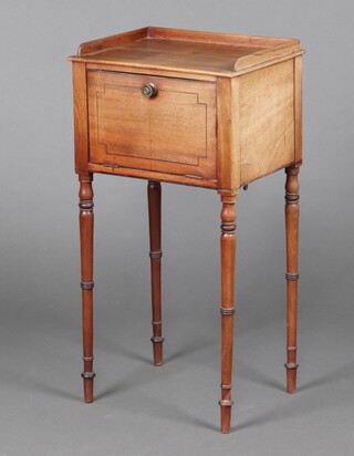 A Georgian bleached mahogany pot cupboard with 3/4 gallery and fall front, raised on turned supports 82cm h x 41cm w x 32cm d 
