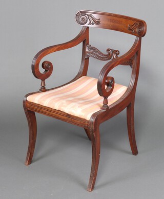 A Georgian carved mahogany bar back chair, raised on sabre supports 87cm h x 52cm w x 48cm d (seat 26cm x 30cm) 