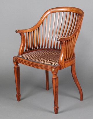 An Edwardian stick and rail tub back chair with upholstered seat, raised on square tapered supports with spade feet 93cm h x 56cm w x 42cm d (seat 27cm x 30cm)  