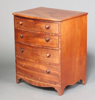 A Victorian mahogany bow front commode converted to a chest of 2 short and 2 long drawers with turned handles 78cm h x 63cm w x 50cm d 