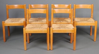 A set of 6 mid-Century Habitat beech framed bar back dining chairs with woven rush seats, raised on turned supports 75cm h x 50cm w x 43cm d (the rush to 1 seat is very worn) 
