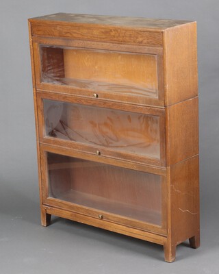An oak 3 tier Globe Wernicke style bookcase 112cm h x 87cm w x 25cm d 