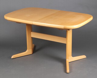 A Danish Skovby light beech extending dining table with 2 extra leaves 74cm h x 124cm x 85cm 