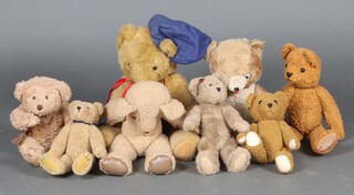 A Jersey teddy bear with articulated limbs 53cm, a Browning bear, "The Buddy Bear" and 5 other various teddy bears  