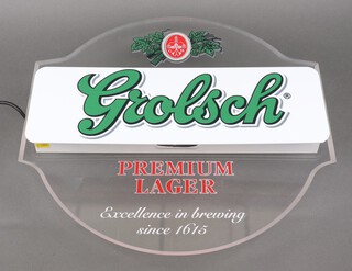 A circular perspex Grolsch illuminating advertising sign 48cm x 50cm 