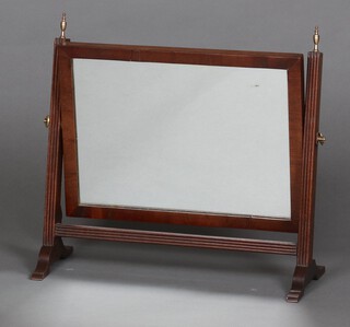 A 19th Century rectangular plate dressing table mirror contained in a mahogany swing frame 40cm h x 42cm w x 6cm d 
