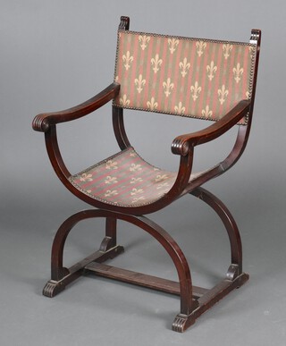 A beech X framed open arm chair upholstered in fleur de lis material 97cm h x 60cm w x 52cm d (stains to upholstery) 