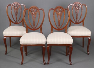 A set of 4 Edwardian, Georgian style mahogany slat and shield back dining chairs with over stuffed seats, raised on turned supports 97cm h x 45cm w x 43cm d  