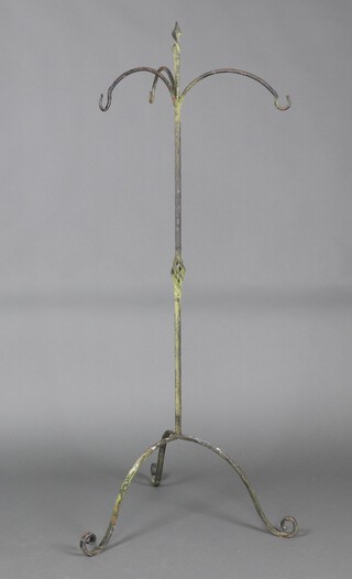 A wrought iron 3 branch hanging basket stand 128cm x 65cm and 2 circular metal plant stands 25cm x 33cm
