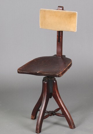 A revolving and adjustable beech framed artists chair with shield shaped seat, raised on outswept supports with X framed stretcher 92cm h x 36cm w x 41cm d 